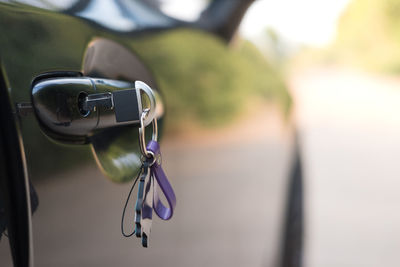 Close-up of keys in car door