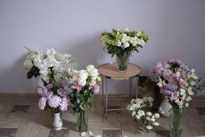 Flowering plant in vase on table