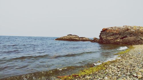 Scenic view of sea against clear sky