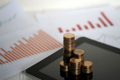 High angle view of coins on table