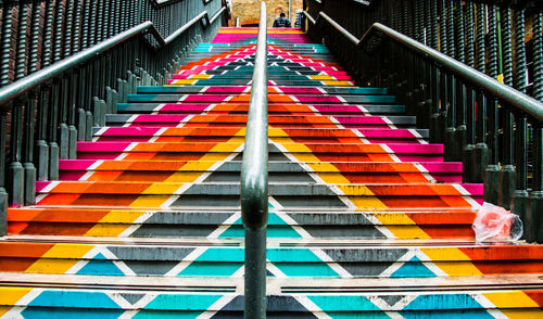 Low angle view of colorful steps in city