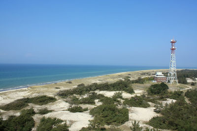 Scenic view of sea against clear blue sky