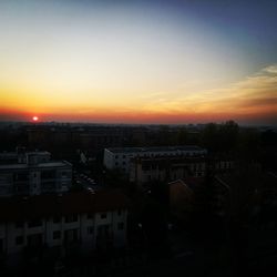 High angle view of townscape against sky during sunset