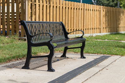 Empty bench in park