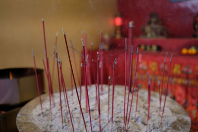 Close-up of incense in temple