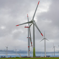 Wind energy company vestas with a red crane during the construction of an onshore wind farm