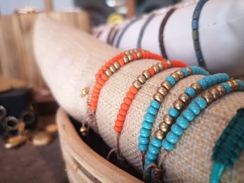 Close-up of multi colored bracelets for sale in market