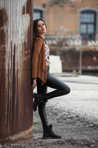 Full length portrait of young woman