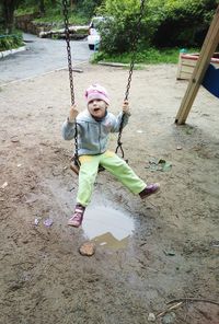 Portrait of girl standing in park