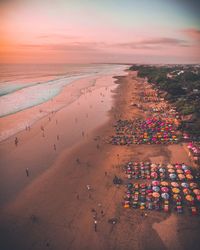 High angle view of beach against sky during sunset