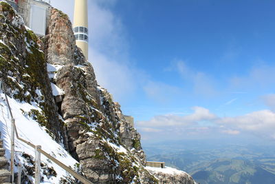 View of mountain range against blue sky