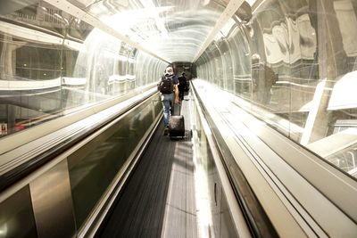 People on escalator