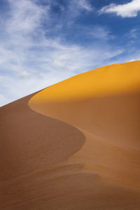 Scenic view of desert against sky