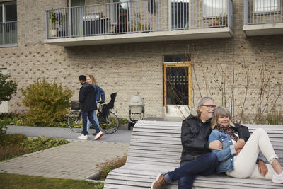 Mature couple relaxing on bench