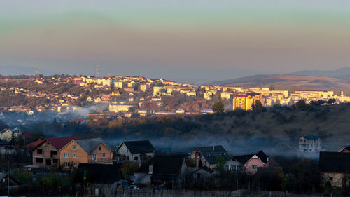 High angle view of townscape against sky at dusk