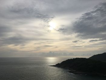 Scenic view of sea against cloudy sky