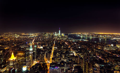 High angle view of illuminated cityscape at night