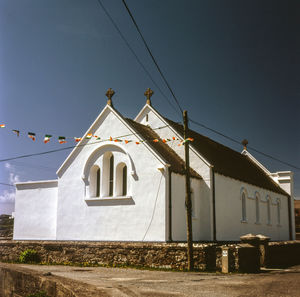 Low angle view of church against clear sky