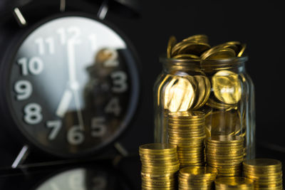 Close-up of coins on glass