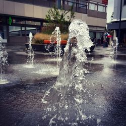 Fountain in front of building