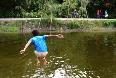 Full length of man swimming in water