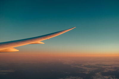 Cropped image of airplane wing