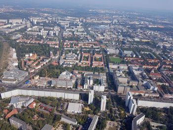 High angle view of illuminated buildings in city