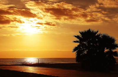 Scenic view of sea against dramatic sky