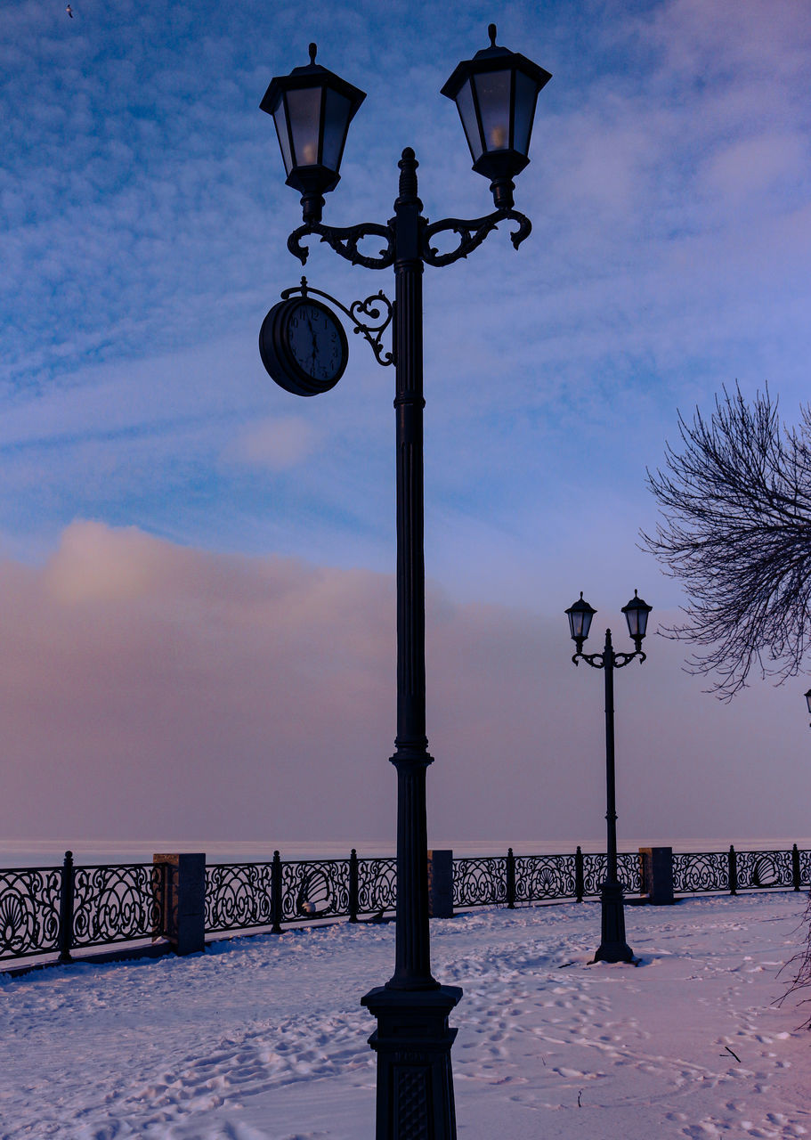 STREET LIGHT WITH SNOW COVERED TREES