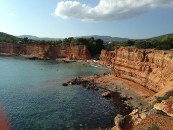 Scenic view of rock formations against sky