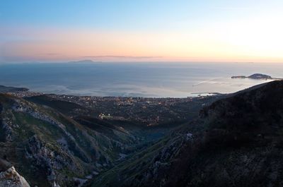 High angle view of cityscape against sky during sunset