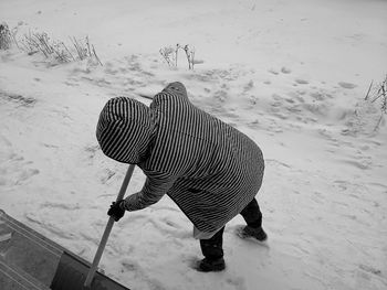 High angle view of horse standing in snow