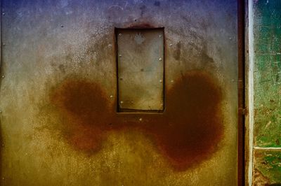 Close-up of rusty window