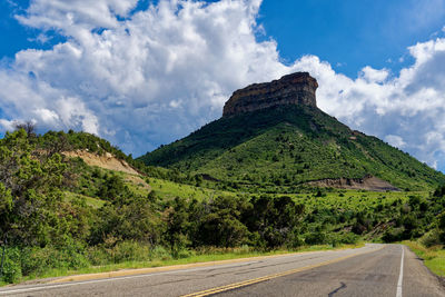 Panoramic view of road amidst mountains against sky