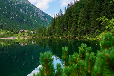 Mountains range near beautiful lake. tatra national park in poland. morskie oko or sea eye lake