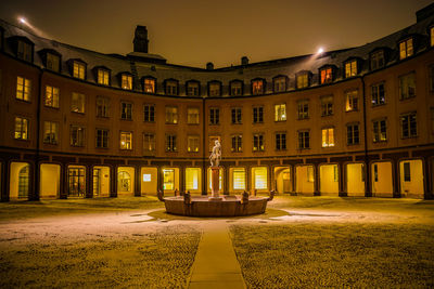 Illuminated building at night