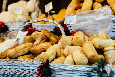 Close-up of breads for sale in wicker basket