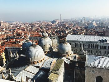 Aerial view of cityscape against sky