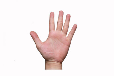 Close-up of human hand over white background
