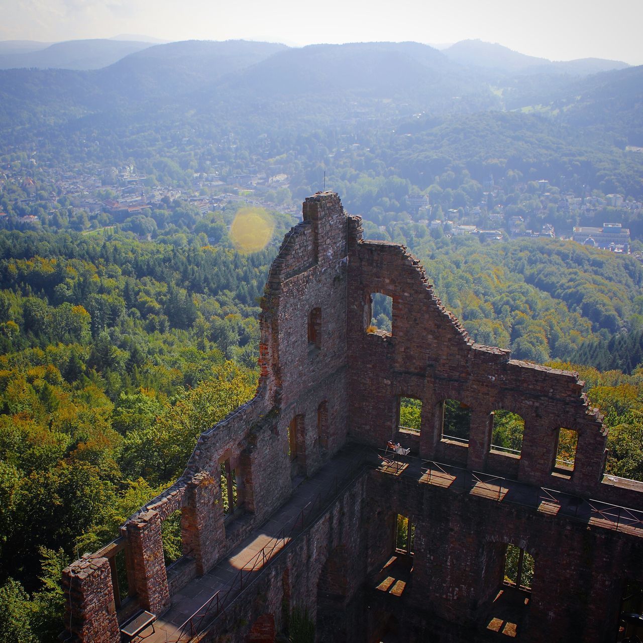 architecture, built structure, building exterior, mountain, history, high angle view, tree, landscape, travel destinations, famous place, the past, ancient, outdoors, travel, old, nature, day, tourism, no people, sky