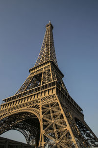 Low angle view of eiffel tower against clear sky