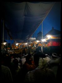 Illuminated market stall at night