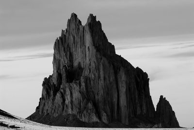 View of rocky structure against clear sky