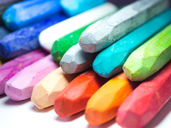 Close-up of multi colored candies on table