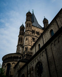 Low angle view of church against blue sky