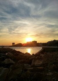 Scenic view of sea at sunset