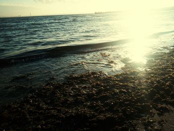 Scenic view of sea against sky at sunset