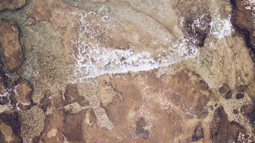 Full frame shot of rocks in sea