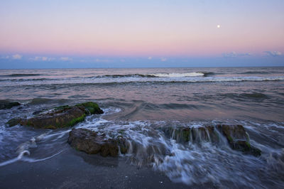 Moonrise on black sea in corbu village, wild beach