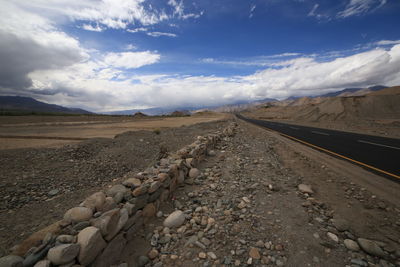 Surface level of railroad track against sky